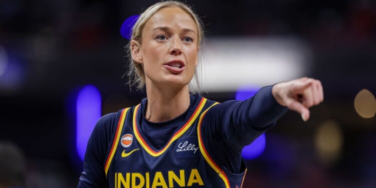 Sophie Cunningham of the Indiana Fever points during the game against the Phoenix Mercury at Gainbridge Fieldhouse on June 22, 2026, in Indianapolis, Indiana.