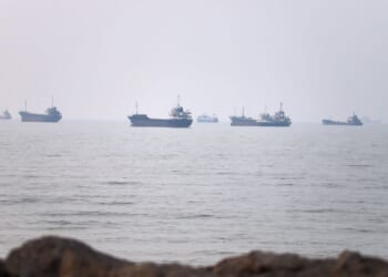 Tanker caught fire after being struck by a projectile in the Strait of Hormuz