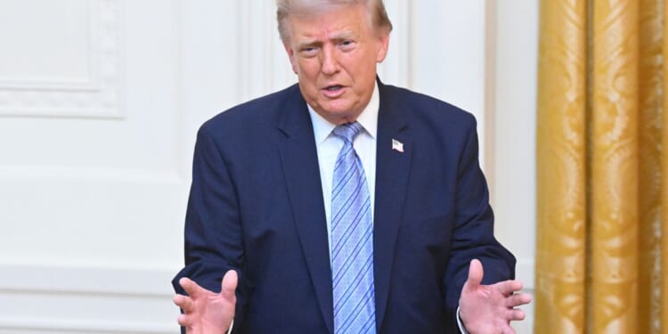 Trump works in a midterm campaign pitch into a primetime address