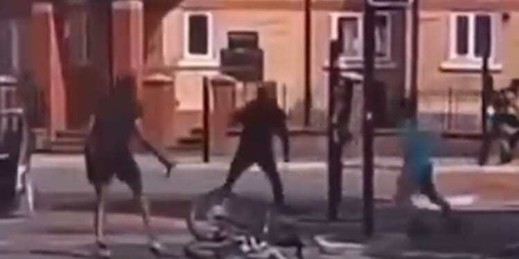 A brawl between five men with machetes unfolded in Manchester, England, as shown by video footage posted on July 13, 2026.