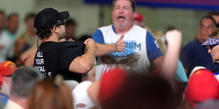 Protester ejected from Trump rally was wearing ‘Kill Your Local Pedophile’ shirt