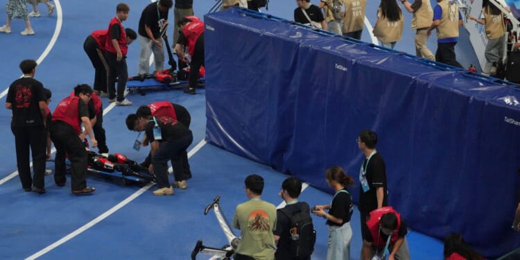A Chinese humanoid robot sets a new 100-meter sprint record at Beijing Games