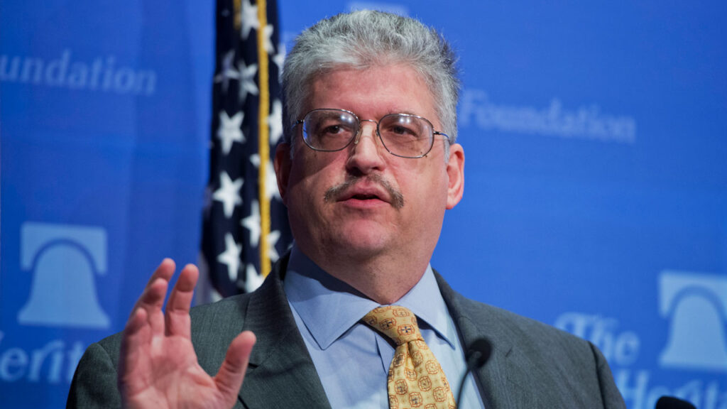 Robert Rector, of the Heritage Foundation, conducts a news conference at the Foundation's offices to discuss the U.S. Senate's "Gang of Eight" immigration bill and how the amnesty portion would have negative effects on the economy. (Photo By Tom Williams/CQ Roll Call)