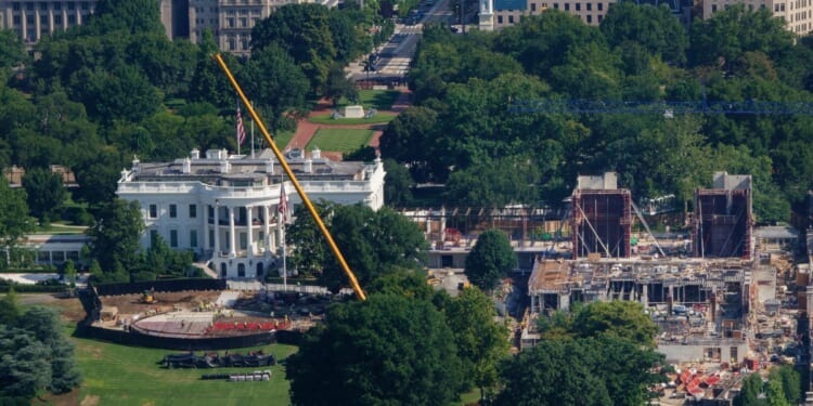Construction continues on a new helipad on the South Lawn of the White House and the East Wing ballroom on Aug. 6, 2026, in Washington, D.C.