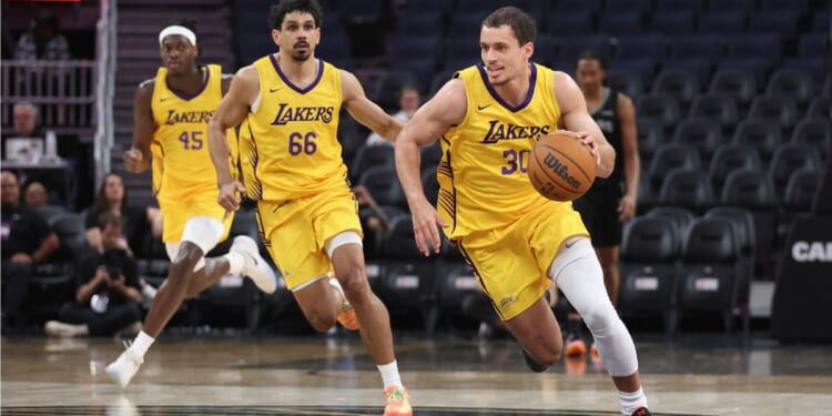 Chris Manon #30 of the Los Angeles Lakers dribbles the ball up court against the San Antonio Spurs at Chase Center on July 6 in San Francisco, California.