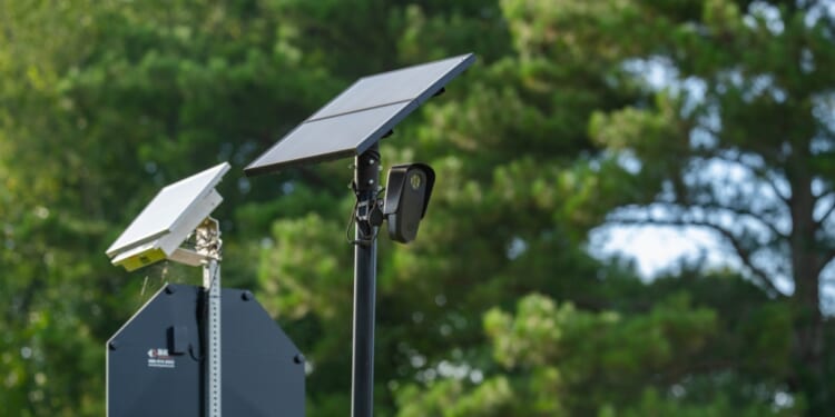 A Flock camera records passersby on July 9, 2026, in Jefferson, Georgia.