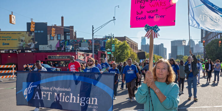 Union members march in Detroit's Labor Day parade.