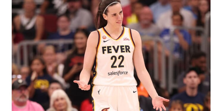 Caitlin Clark #22 of the Indiana Fever reacts against the Chicago Sky during the first half Saturday at United Center in Chicago, Illinois.