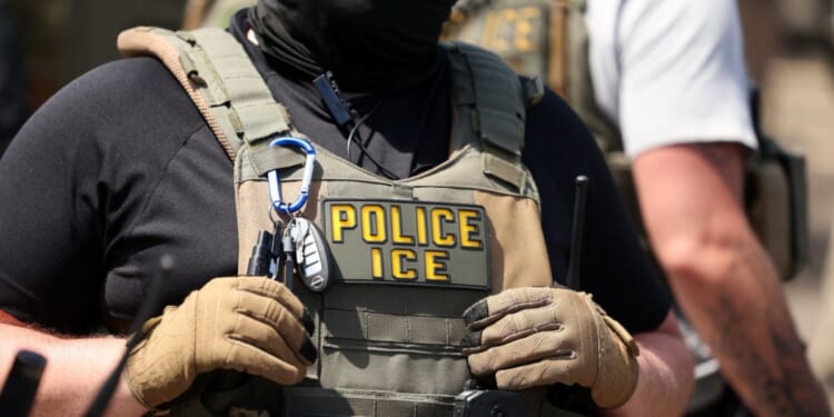An Immigration and Custom's Enforcement agent stands in Newark, New Jersey, on May 26, 2026.
