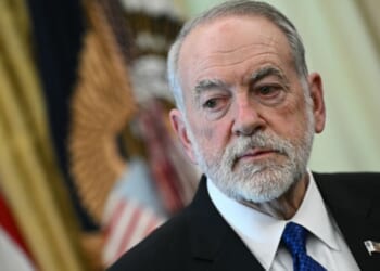 U.S. Ambassador to Israel Mike Huckabee listens during a meeting with President Donald Trump at the White House in Washington, D.C., on April 23, 2026.