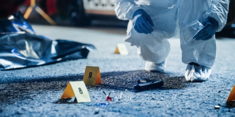 Stock photo shows a crime scene investigation. Police are investigating a mass shooting in Minneapolis Wednesday that left at least one person dead.
