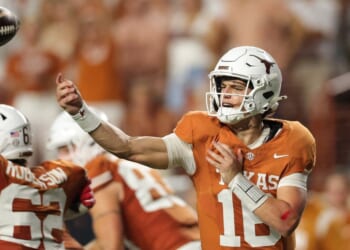Arch Manning #16 of the Texas Longhorns passes the ball against the Ohio State Buckeyes Saturday during the third quarter at Darrell K Royal-Texas Memorial Stadium in Austin, Texas.