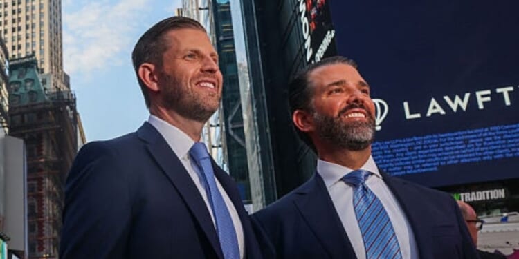 Eric Trump, left, and his brother Donald Trump Jr. are pictured in New York City's Times Square in 2025.