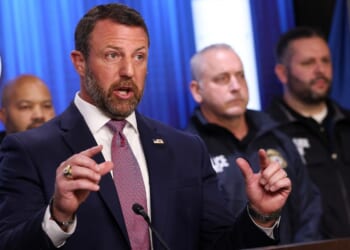 Secretary of Homeland Security Markwayne Mullin speaks during a news conference Friday at U.S. Immigration and Customs Enforcement headquarters in Washington, D.C.