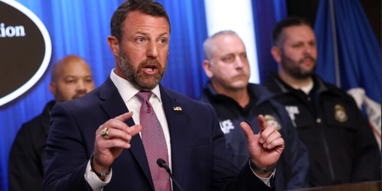 Secretary of Homeland Security Markwayne Mullin speaks during a news conference Friday at U.S. Immigration and Customs Enforcement headquarters in Washington, D.C.