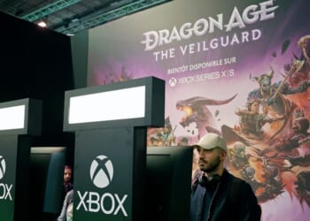 A gamer plays a video game developed by BioWare and published by Electronic Arts on the Xbox console during the "Paris Games Week" on Oct. 22, 2024, in Paris, France.