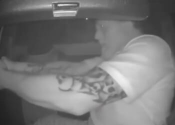 Viral dashcam footage showed a South African dad defending his children from armed carjackers who surrounded their car Oct. 7.