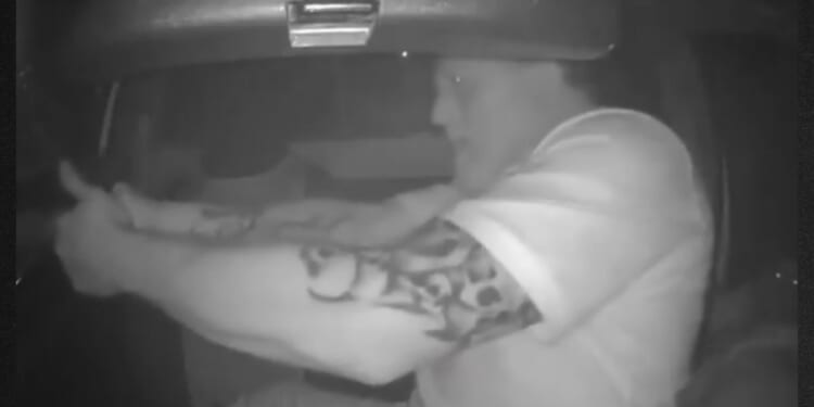 Viral dashcam footage showed a South African dad defending his children from armed carjackers who surrounded their car Oct. 7.