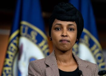 Rep. Ilhan Omar looks on during a news conference on reintroducing the Neighbors Not Enemies Act on Capitol Hill on Jan. 22, 2025, in Washington, D.C.