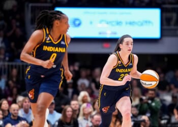 Caitlin Clark and Kelsey Mitchell of the Indiana Fever bring the ball up the floor against the Toronto Tempo during the first half in their WNBA game at Coca-Cola Coliseum on Sept. 18, 2026, in Toronto, Canada.
