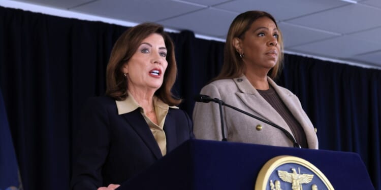 New York Gov. Kathy Hochul stands with New York Attorney General Letitia James at a news conference in Manhattan, where the governor announced a review of Cornell University’s initial response to allegations from a former student about being raped at a campus fraternity in 2024 on Oct. 2, 2026, in New York City.
