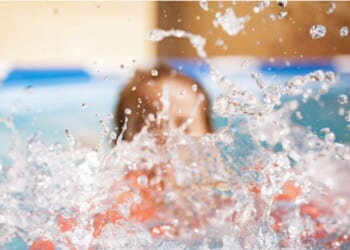Surveillance video showed the boy swimming toward the center of the pool before abruptly "turning in circles and splashing vigorously.”