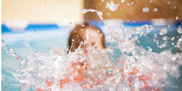 Surveillance video showed the boy swimming toward the center of the pool before abruptly "turning in circles and splashing vigorously.”