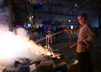 Macron condemns those who 'sought to bring down the Republic' after rioting mars nationwide protests