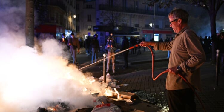 Macron condemns those who 'sought to bring down the Republic' after rioting mars nationwide protests