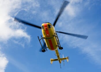 A medical helicopter, similar to that seen in a stock photo, crashed off the California coast. One occupant is missing, two were confirmed dead, and two were hospitalized.