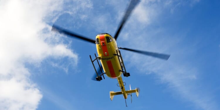 A medical helicopter, similar to that seen in a stock photo, crashed off the California coast. One occupant is missing, two were confirmed dead, and two were hospitalized.