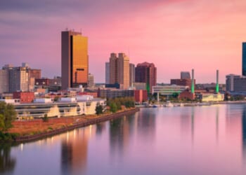 The skyline of Toledo, Ohio is pictured during the dusk of day.