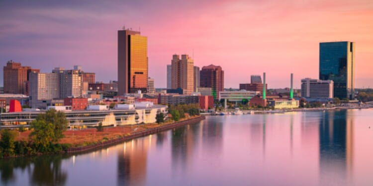 The skyline of Toledo, Ohio is pictured during the dusk of day.
