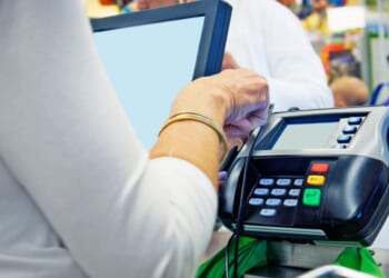 Investigators said the woman used EBT cards at stores and also traded them for illicit drugs.