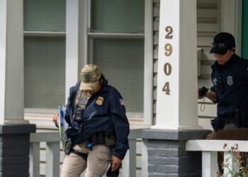 Homeland Security Investigations police search the Washington, D.C. home of Rep. Ilhan Omar, a Minnesota Democrat, Monday.