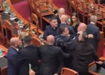 Members of Parliament from the ruling Socialist Party clash with colleagues from the opposition Democratic Party Thursday in Tirana, Albania.