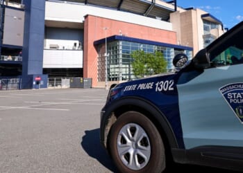 A general exterior view of Boston Stadium as a Massachusetts State Police car is seen ahead of the FIFA World Cup 2026 Group C match between Haiti and Scotland at Boston Stadium on June 13, 2026, in Foxborough, United States.