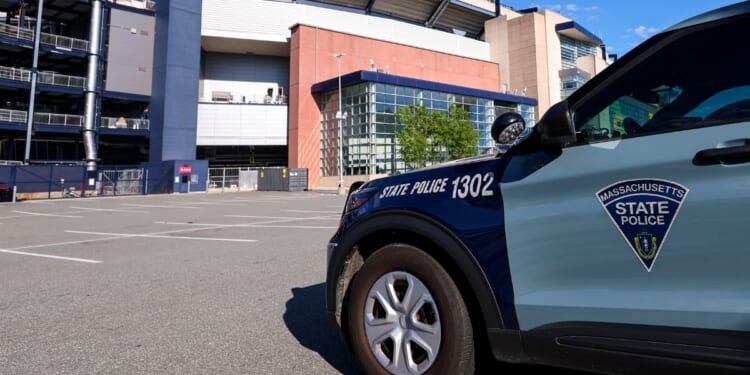 A general exterior view of Boston Stadium as a Massachusetts State Police car is seen ahead of the FIFA World Cup 2026 Group C match between Haiti and Scotland at Boston Stadium on June 13, 2026, in Foxborough, United States.