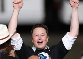SpaceX founder Elon Musk celebrates after the successful launch of the SpaceX Falcon 9 rocket with the manned Crew Dragon spacecraft at the Kennedy Space Center on May 30, 2020, in Cape Canaveral, Florida.