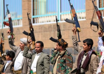 Fighters loyal to the Houthi authorities take part in a rally to recruit more fighters in Sanaa on Oct. 7, 2026.