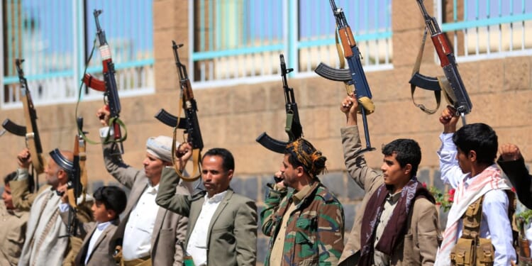 Fighters loyal to the Houthi authorities take part in a rally to recruit more fighters in Sanaa on Oct. 7, 2026.