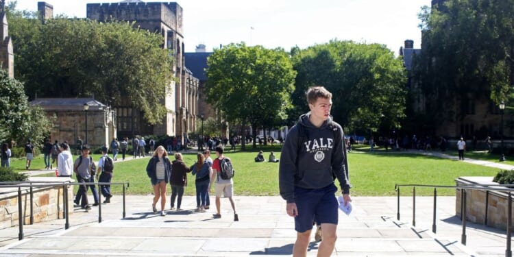 Students walk through the campus of Yale University on Sept. 27, 2018, in New Haven, Connecticut.