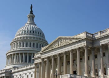 The United States Capitol stands on a sunny day in Washington, D.C.