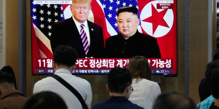 Trump says he may see North Korea's Kim Jong-un during Asia trip