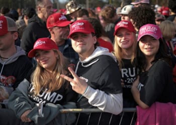 Young Trump voters are pictured at a rally on February 10, 2024 in Conway, South Carolina.